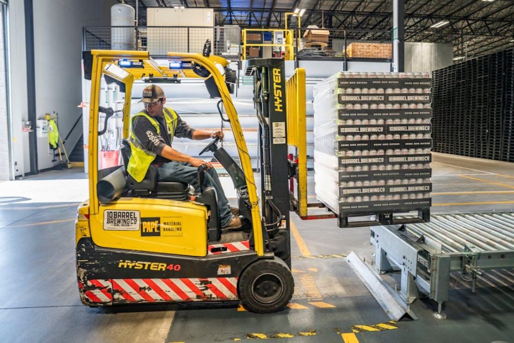 An image of a worker operating a forklift