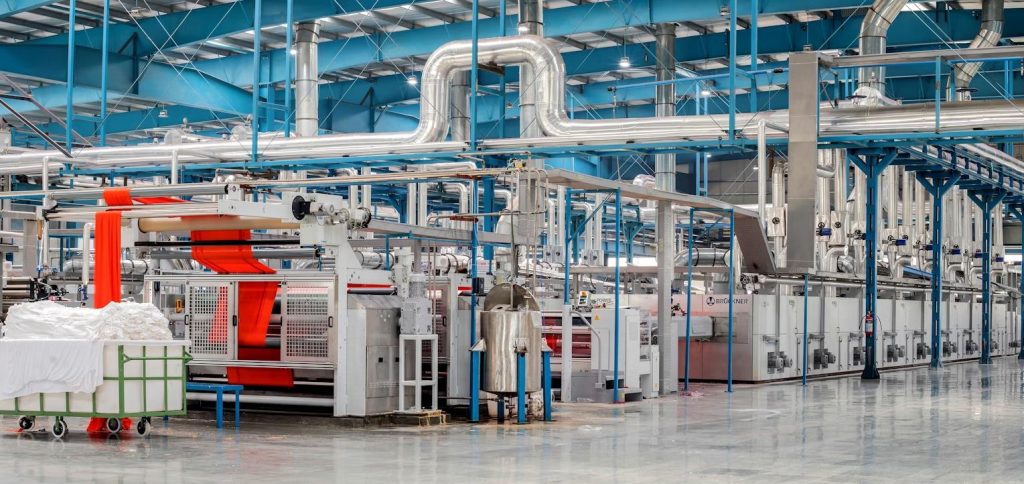 An image of a factory with a clean, shiny floor