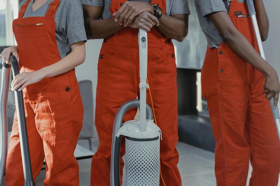 Professional janitorial team performing facility hygiene risk management cleaning