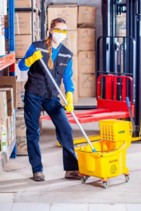 Professional warehouse floor cleaning service supporting machinery maintenance 
